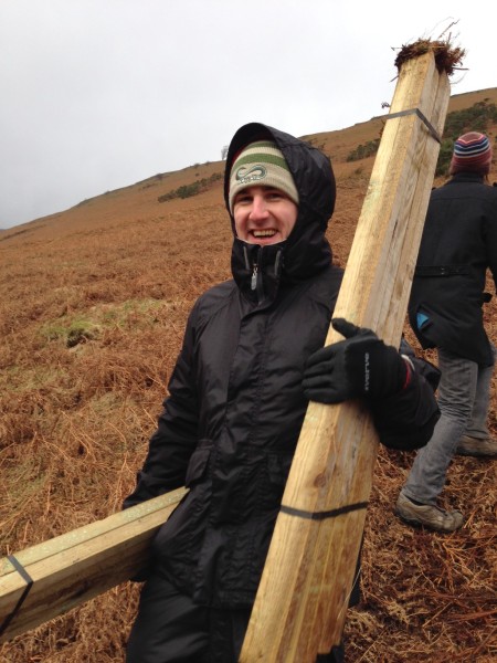 Jake with his stakes, planting trees in Cumbria as part of our carbon scheme archipelagochoice.com